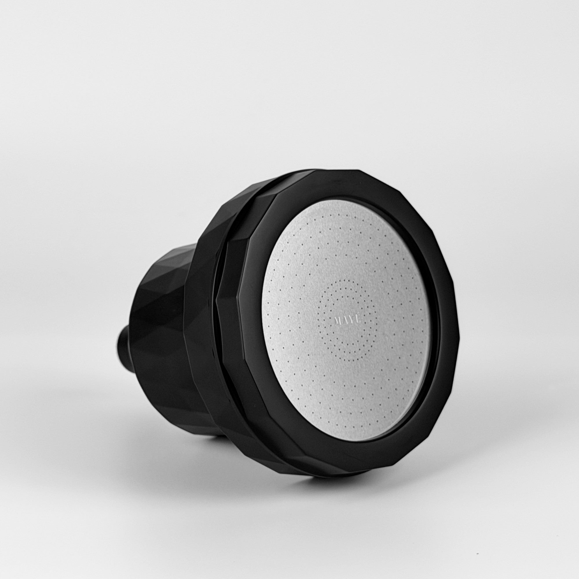 MAYÉ 8-Stage Shower Filter in Matte Black — angled view showing spray face
